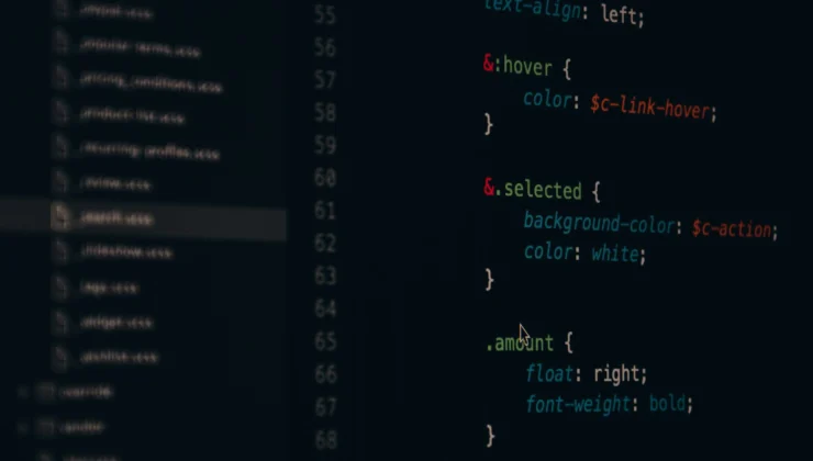Close-up of colorful CSS code lines on a computer screen for web development.